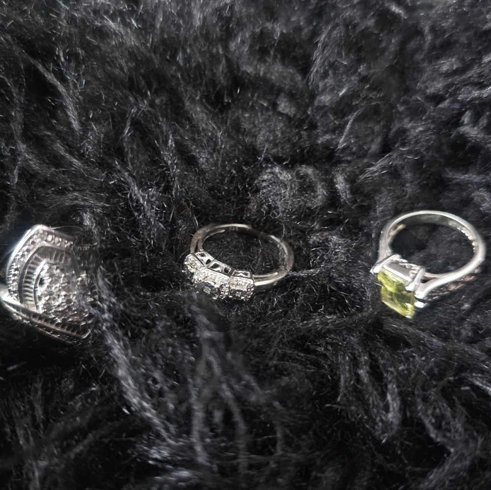 Bundle of 925 sterling silver rings 2 have diamond chips